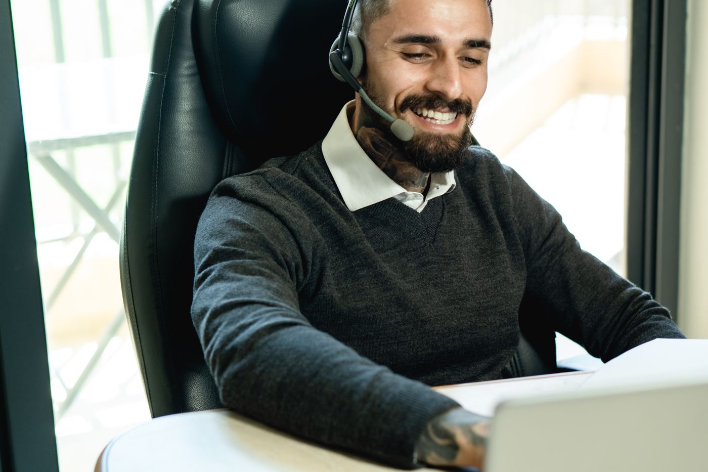 A professional talking through his headset